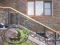 Кованое ограждение лестницы в модернистском стиле. Фото 54.